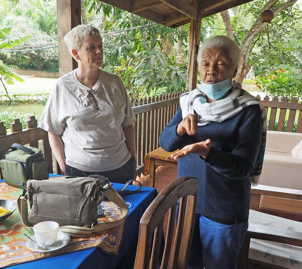 Sheila and Marie stand side by side.